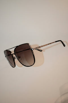 Sunglasses by Bebe
