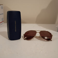 Draper James sunglasses classic aviator style with gold-toned metal frames.