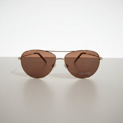 Draper James sunglasses classic aviator style with gold-toned metal frames.